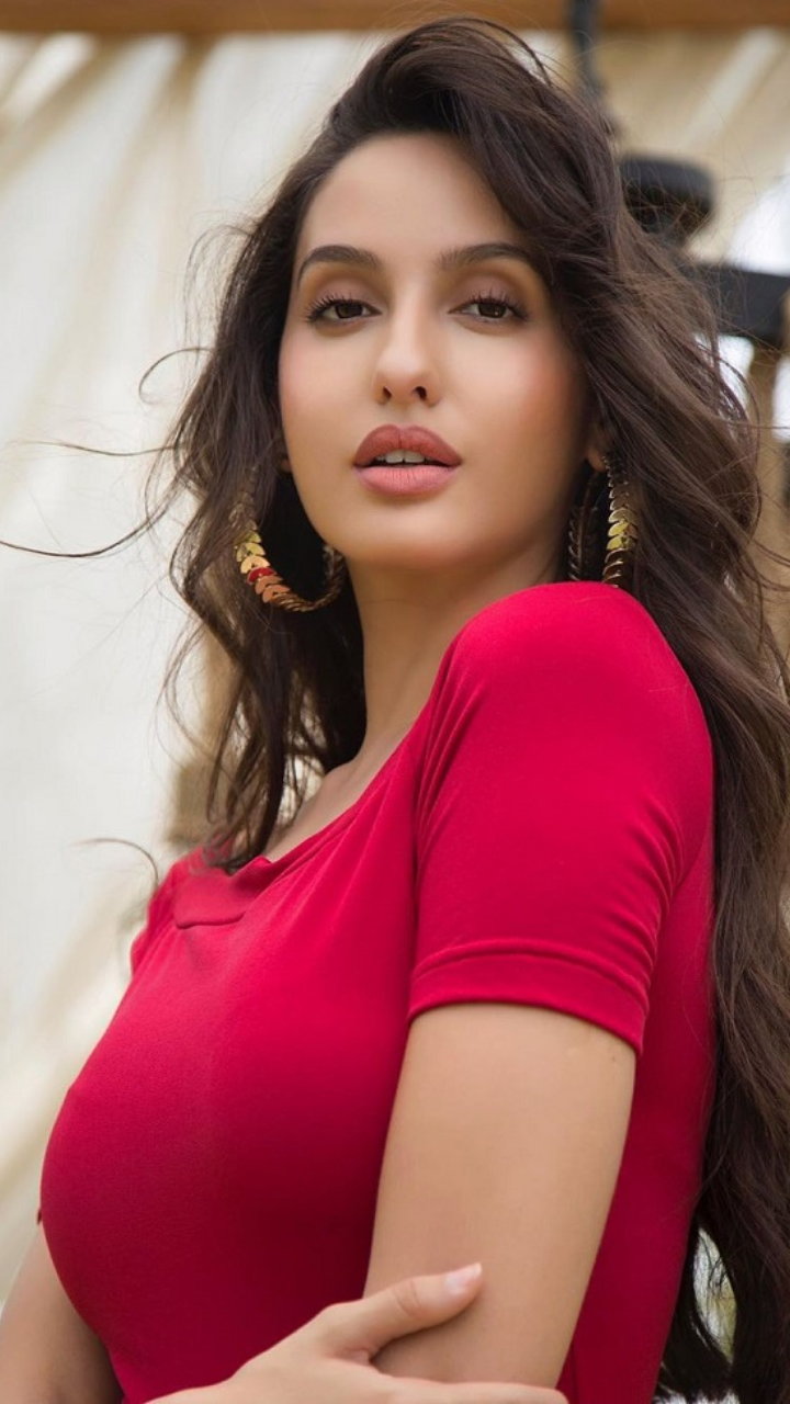 nora fatehi red dress Nora Fatehi Shows How To Rock Any Dress