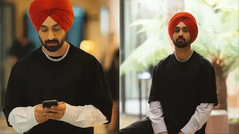 Diljit Dosanjh reacts to a fan throwing phone towards him during his Paris concert