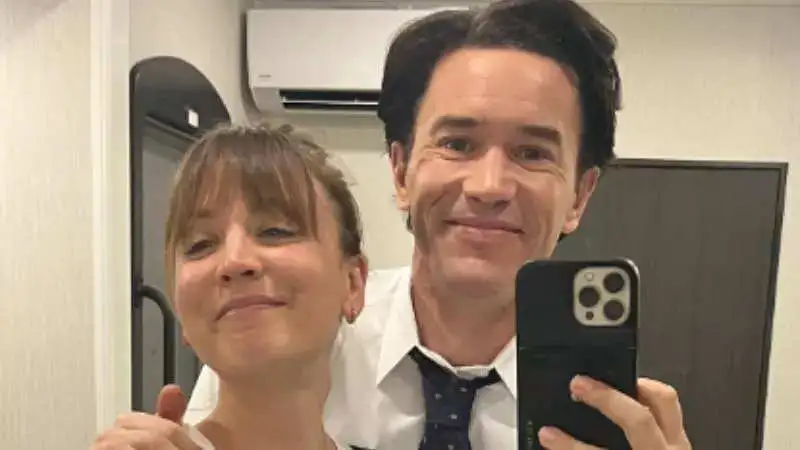 Kaley Cuoco says she is expecting a child with Tom Pelphrey and flaunts her baby bump