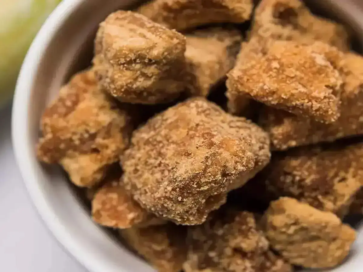 Jaggery kept in a white bowl