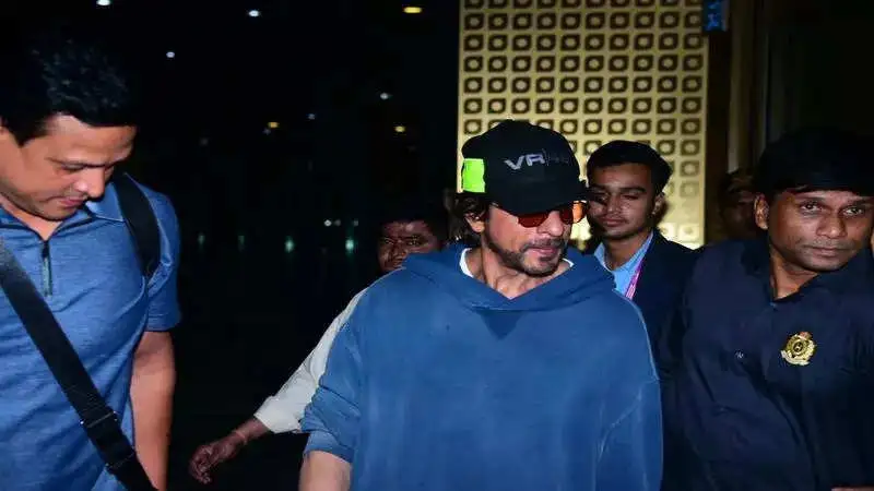 Shah Rukh Khan looks fit and healthy as he returns to Mumbai amid reports of minor surgery